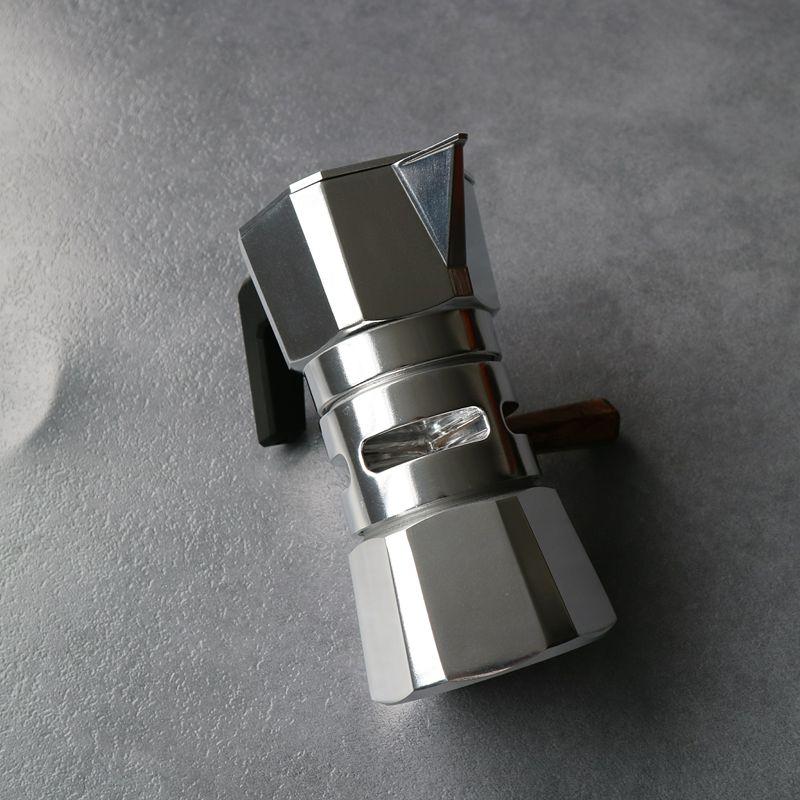 Silver double valve Moka Pot for stovetop coffee making.