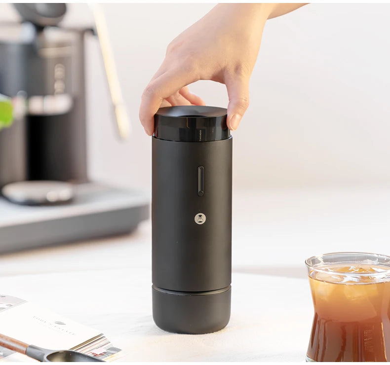 42mm burrs for consistent grind, portable design for travel.