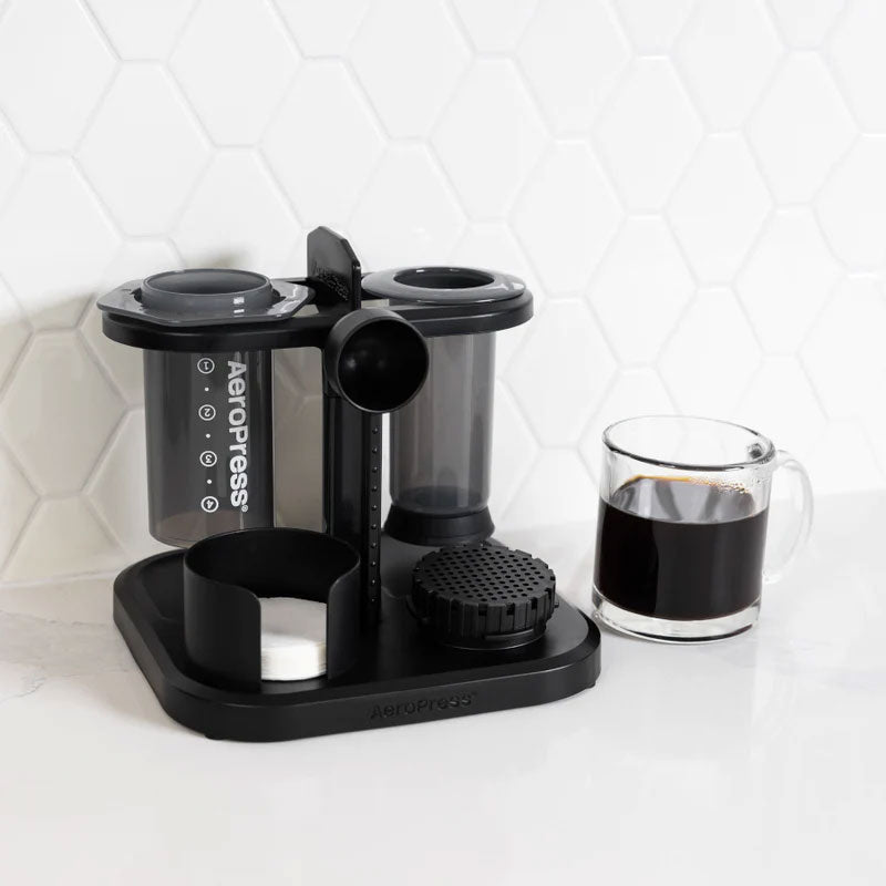 AeroPress Organizer Stand for Original, clear, and XL versions displayed together.