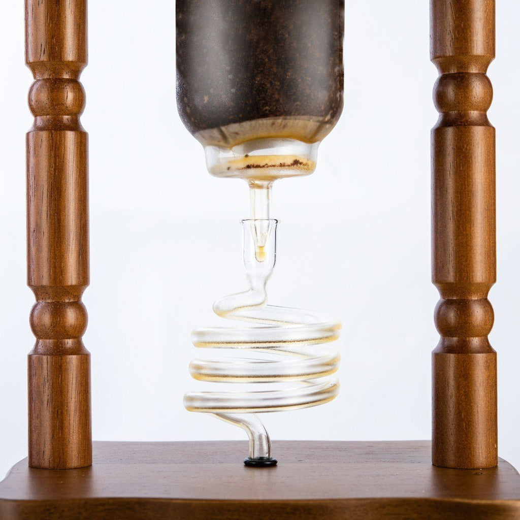 Curved brown wood frame for the Yama 32 oz Cold Brew Tower