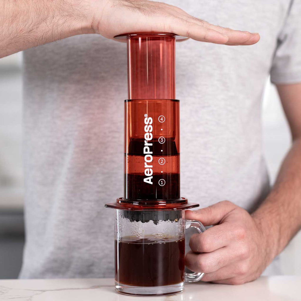 Red version of the 10 oz AeroPress Clear Coffee Maker