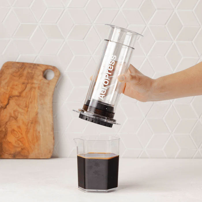 AeroPress Clear XL 20 oz Brewer with Carafe and carafe holder.