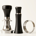 Espresso accessory kit on a clean white background without the box
