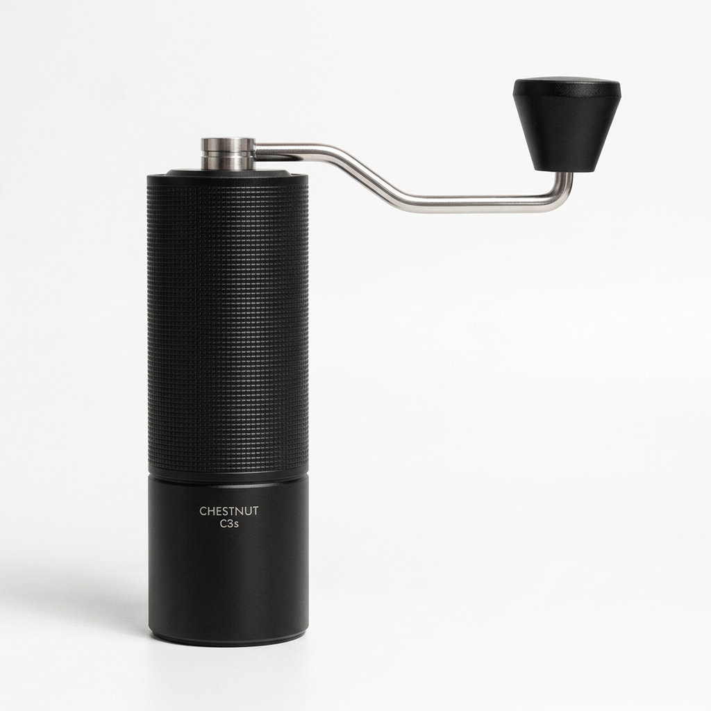 TIMEMORE Chestnut C3S grinder upright on a clean white background with warm studio lighting and a subtle shadow